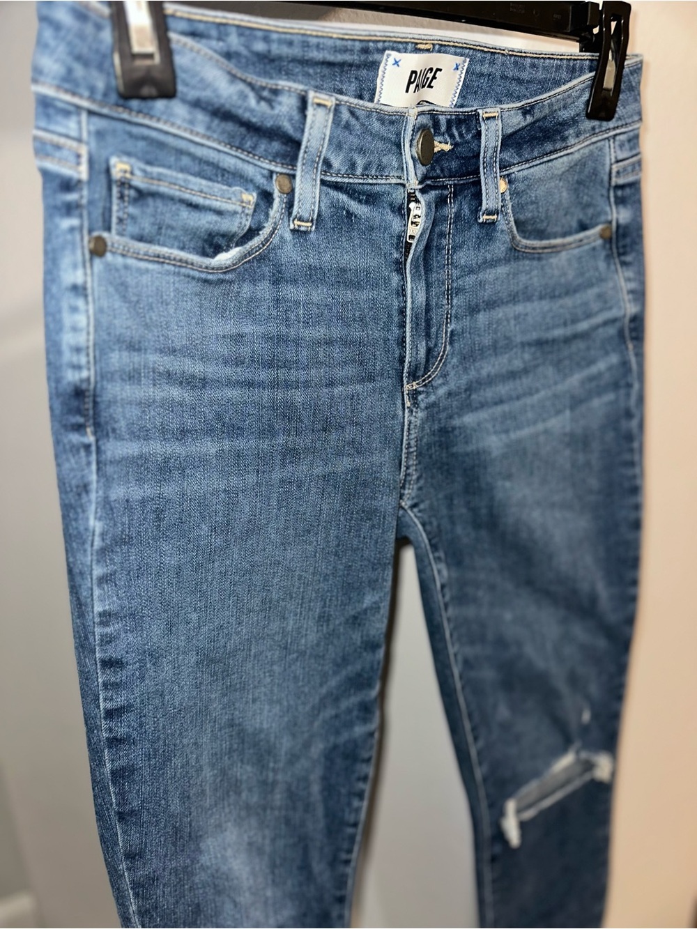 PAIGE Light Blue Skinny Jeans with Subtle Distressing